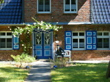 Ferienwohnung in Wustrow - Charmante Wohnung mit gro&szlig;em Garten - Bild 1